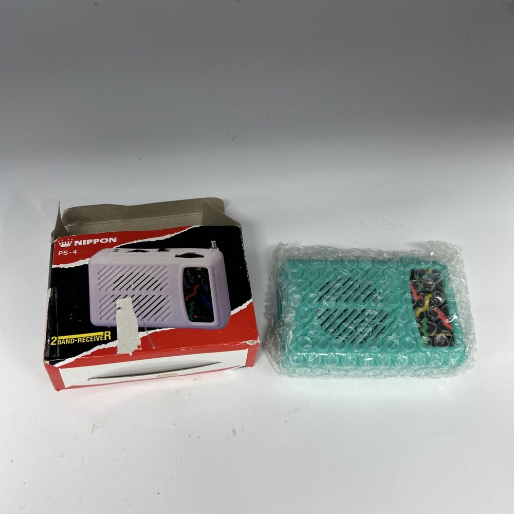 vintage Nippon PS-4 portable AM/FM 2-band radio, packaged in its original Box